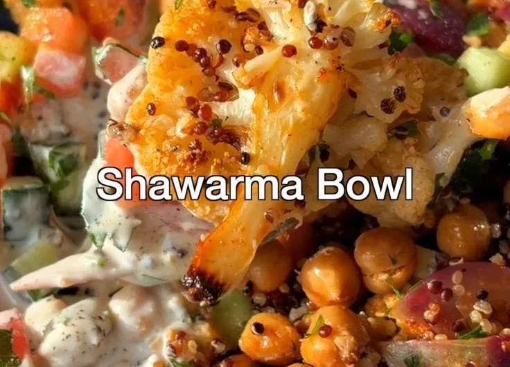 Delicious Cauliflower Shawarma Bowl served on a sheet pan with fresh vegetables