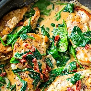 Delicious Low Carb Creamy Tuscan Chicken served with vegetables
