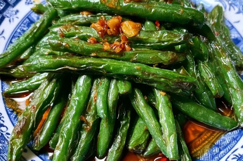 Delicious Chinese green beans stir fry with vibrant colors and fresh ingredients.
