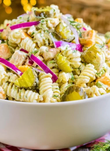 Creamy Dill Pickle Macaroni Salad in a colorful bowl
