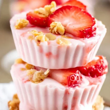 Delicious frozen strawberry yogurt bites served in a bowl, perfect for snacks.