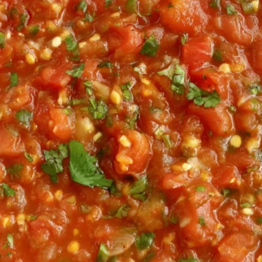 Delicious homemade smoked salsa served in a bowl with tortilla chips