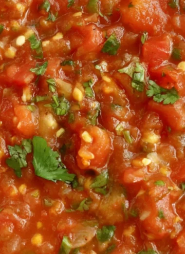 Delicious homemade smoked salsa served in a bowl with tortilla chips