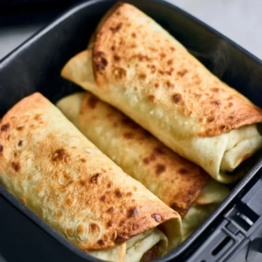 Delicious chimichangas made in an air fryer, golden and crispy.