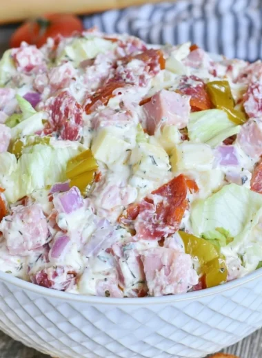 Italian Hoagie Dip featuring salami, provolone, and fresh herbs