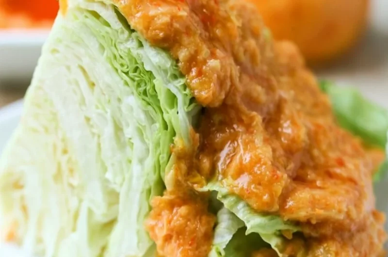 Japanese carrot ginger dressing in a bowl with fresh ingredients