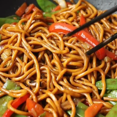 Delicious bowl of Lo Mein noodles with vegetables and sauce