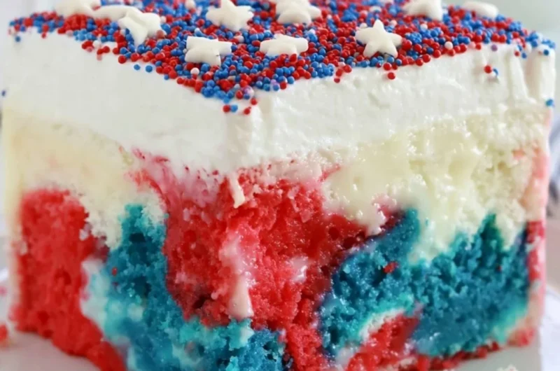 Patriotic Poke Cake decorated in red, white, and blue for 4th of July celebrations