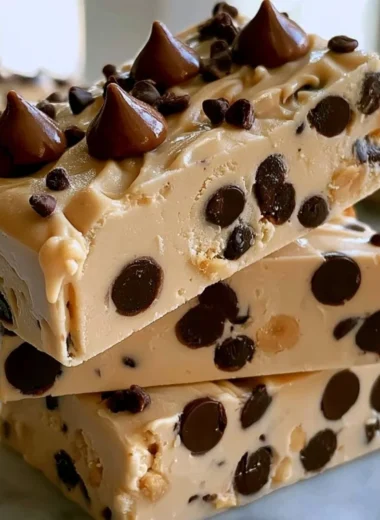 Peanut Butter Frozen Yogurt Bars served on a plate with chocolate drizzle