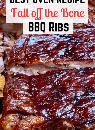 Deliciously smoked St. Louis ribs served on a plate with barbecue sauce.