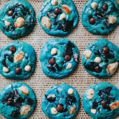 Delicious Ultimate Cookie Monster Cookies with vibrant blue frosting and chocolate chips.