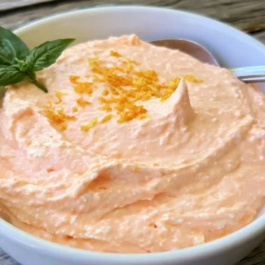 Cottage Cheese Orange Creamsicle Protein Bowl topped with fresh orange slices and creamy texture