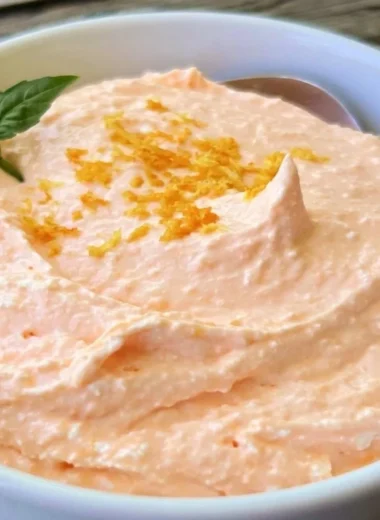 Cottage Cheese Orange Creamsicle Protein Bowl topped with fresh orange slices and creamy texture