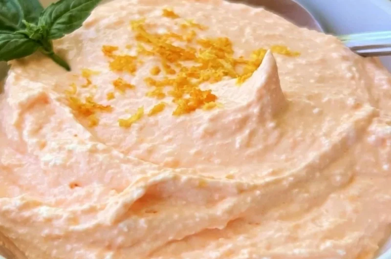Cottage Cheese Orange Creamsicle Protein Bowl topped with fresh orange slices and creamy texture