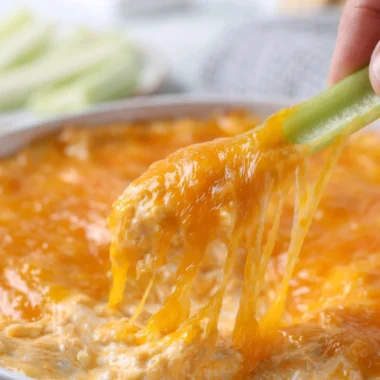 Delicious cozy Buffalo Chicken Dip served in a bowl with tortilla chips