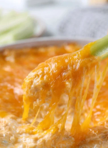 Delicious cozy Buffalo Chicken Dip served in a bowl with tortilla chips