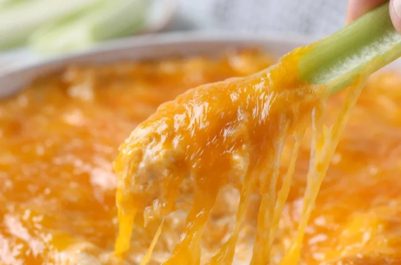 Delicious cozy Buffalo Chicken Dip served in a bowl with tortilla chips