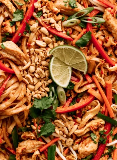 Cozy Chicken Pad Thai with stir-fried noodles and fresh ingredients
