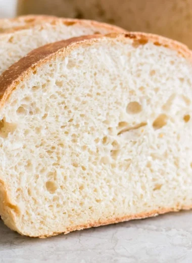 Loaf of super soft sourdough sandwich bread sliced and ready for sandwiches