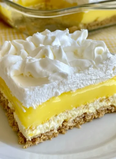 Cozy Lemon Delight dessert garnished with lemon slices and mint leaves