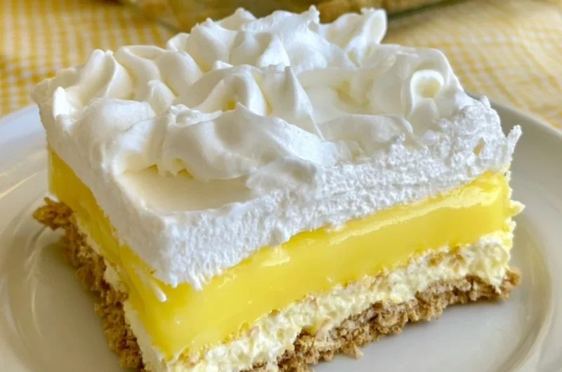 Cozy Lemon Delight dessert garnished with lemon slices and mint leaves