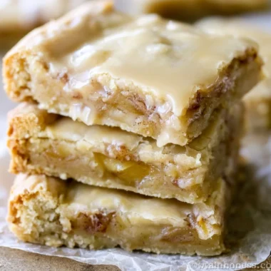 Delicious maple glazed apple blondies with fresh apples and drizzled glaze.