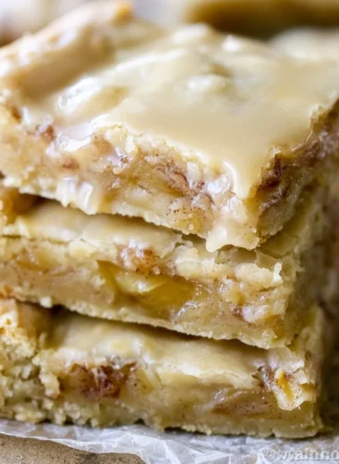 Delicious maple glazed apple blondies with fresh apples and drizzled glaze.