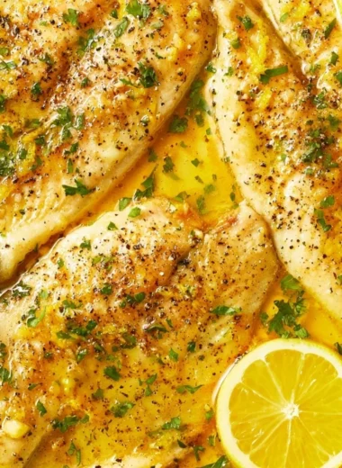 Delicious oven baked tilapia seasoned with herbs and ready to serve.